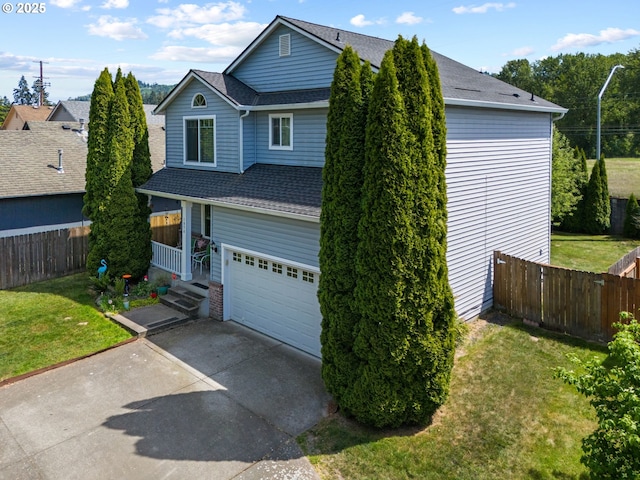 view of front of home with a garage, a shingled roof, and concrete driveway