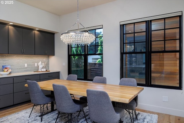 542 4th St, Lake Oswego, OR 97034 - dining room featuring light wood-style flooring and a chandelier