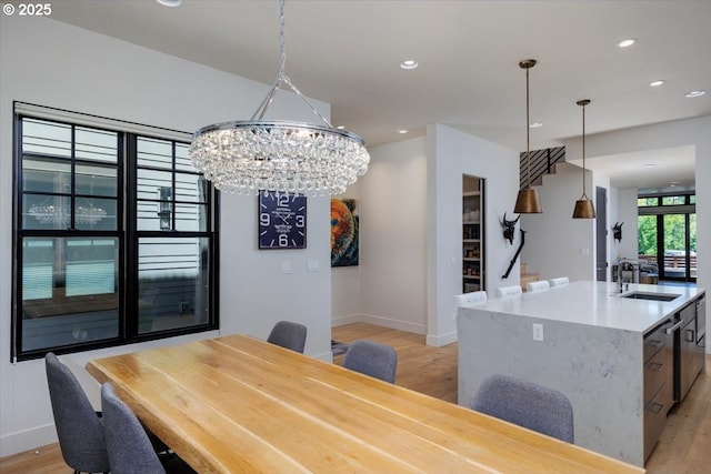 542 4th St, Lake Oswego, OR 97034 - dining space with light wood-style flooring, recessed lighting, and a chandelier