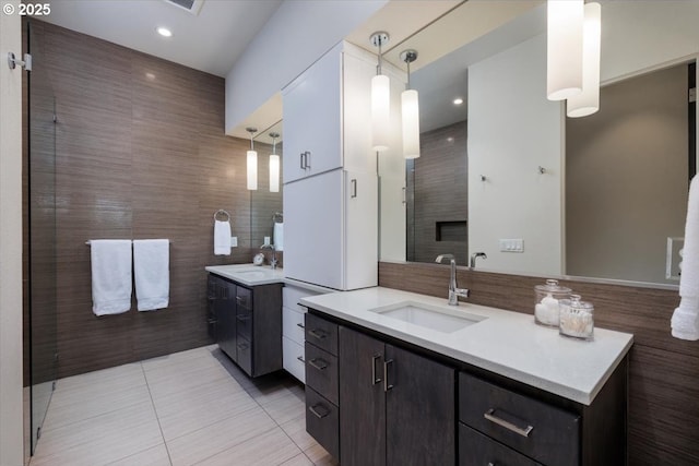542 4th St, Lake Oswego, OR 97034 - full bath featuring tile patterned floors, two vanities, tile walls, and recessed lighting