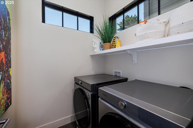 542 4th St, Lake Oswego, OR 97034 - washroom with washer and dryer and baseboards