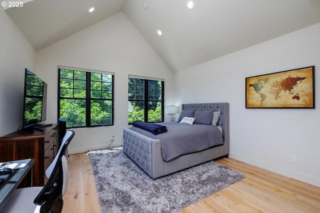 542 4th St, Lake Oswego, OR 97034 - bedroom with wood finished floors, recessed lighting, high vaulted ceiling, and a desk