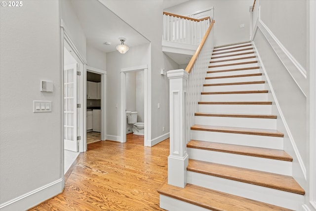 1206 NW Mayfield Rd, Portland, OR 97229 - stairs with wood finished floors and baseboards