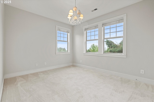 1206 NW Mayfield Rd, Portland, OR 97229 - carpeted spare room featuring a chandelier and baseboards
