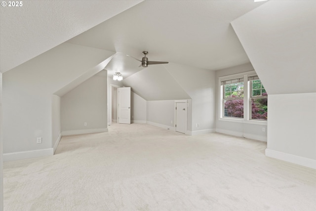 1206 NW Mayfield Rd, Portland, OR 97229 - additional living space with carpet, lofted ceiling, a ceiling fan, and baseboards