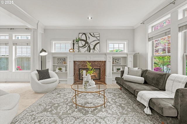 1206 NW Mayfield Rd, Portland, OR 97229 - living area featuring a glass covered fireplace, ornamental molding, and healthy amount of natural light