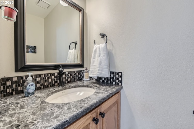 5839 NW Necanicum Way, Portland, OR 97229 - bathroom with vanity and a textured wall