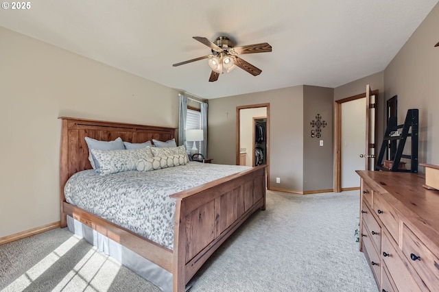 5839 NW Necanicum Way, Portland, OR 97229 - bedroom featuring light colored carpet, a walk in closet, and ceiling fan