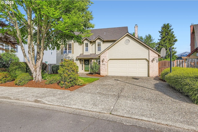 5839 NW Necanicum Way, Portland, OR 97229 - traditional home with an attached garage, driveway, brick siding, and a gate