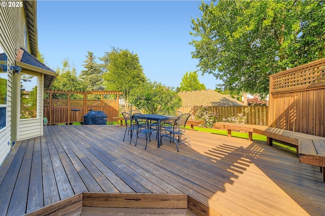 5839 NW Necanicum Way, Portland, OR 97229 - wooden terrace with a fenced backyard and outdoor dining space