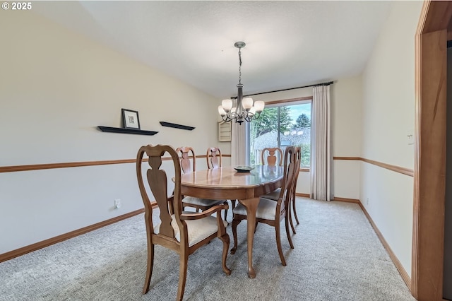 5839 NW Necanicum Way, Portland, OR 97229 - dining space featuring a chandelier and light carpet