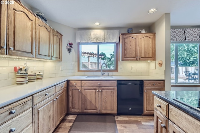5839 NW Necanicum Way, Portland, OR 97229 - kitchen featuring dishwasher, light wood-style flooring, recessed lighting, stovetop, and decorative backsplash