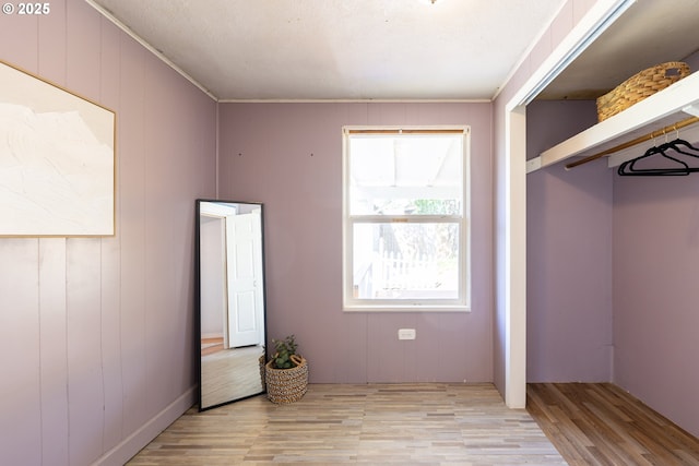 125 NE 80th Ave, Portland, OR 97213 - unfurnished bedroom featuring multiple windows and light wood-style flooring
