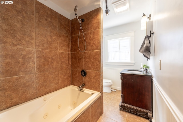 125 NE 80th Ave, Portland, OR 97213 - bathroom with a combined bath / shower with jetted tub, tile patterned flooring, wainscoting, and vanity