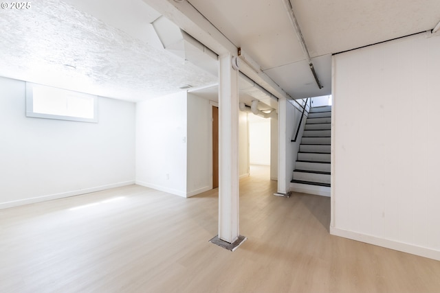 125 NE 80th Ave, Portland, OR 97213 - basement featuring light wood finished floors and stairs