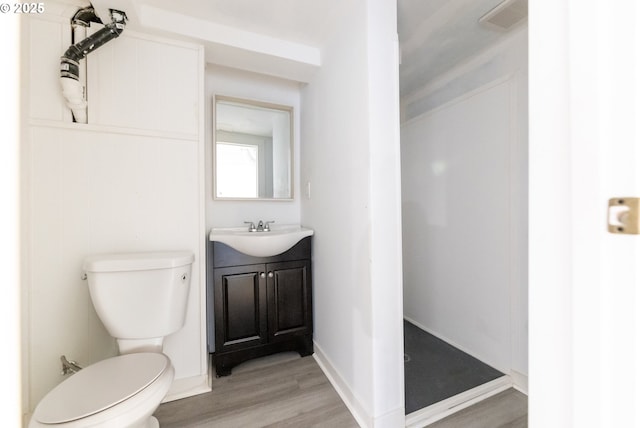 125 NE 80th Ave, Portland, OR 97213 - bathroom featuring wood finished floors, a shower stall, and vanity