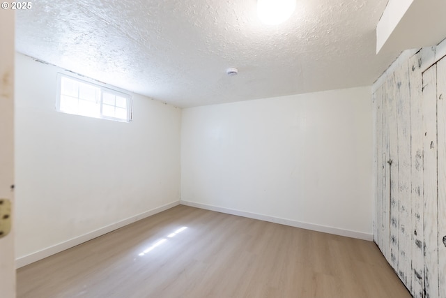 125 NE 80th Ave, Portland, OR 97213 - empty room with wood finished floors and a textured ceiling