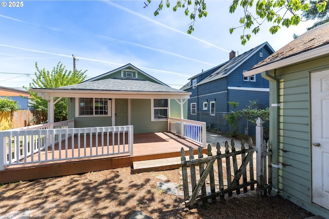 125 NE 80th Ave, Portland, OR 97213 - view of front of home with roof with shingles and a wooden deck