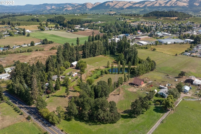 aerial view featuring a rural view and a mountain view