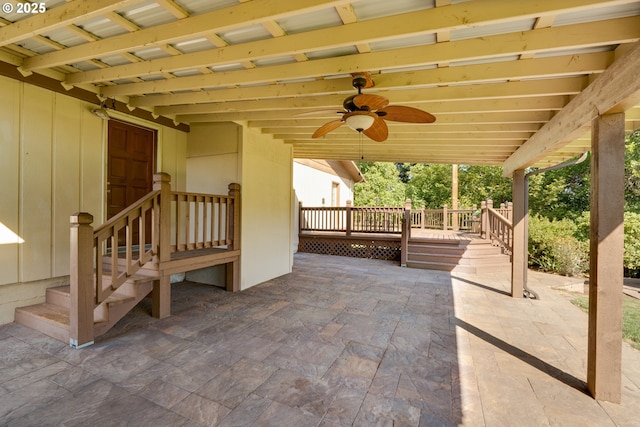 view of patio / terrace with ceiling fan and a deck