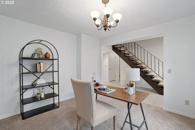 carpeted office with a chandelier, baseboards, and a textured ceiling