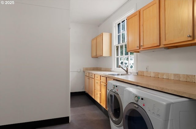 3707 SW 52nd Pl Unit 1, Portland, OR 97221 - laundry area featuring washing machine and dryer, cabinet space, and baseboards