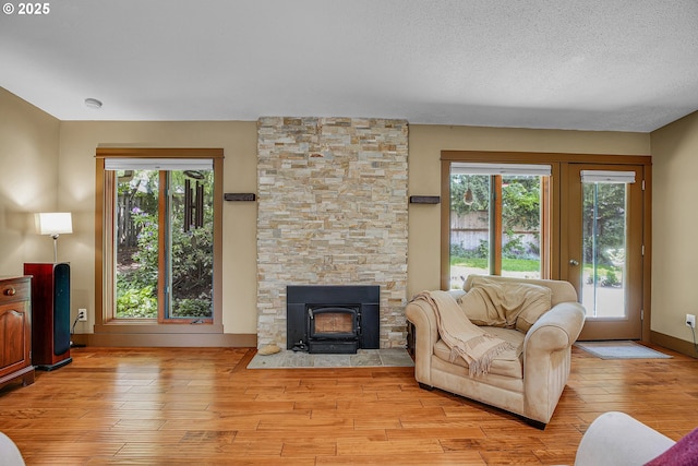 180 NW 107th Ave, Portland, OR 97229 - living room featuring light wood-type flooring and baseboards