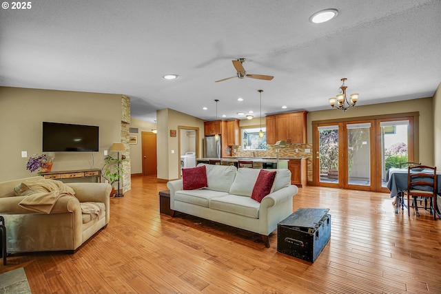 180 NW 107th Ave, Portland, OR 97229 - living area with light wood-style floors, a chandelier, a ceiling fan, and recessed lighting