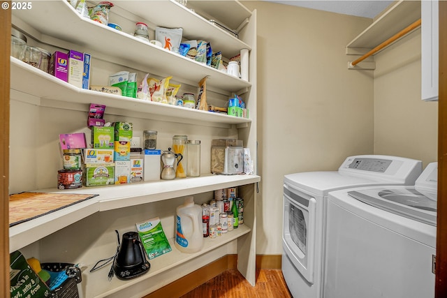 180 NW 107th Ave, Portland, OR 97229 - laundry room featuring washer and clothes dryer and wood finished floors