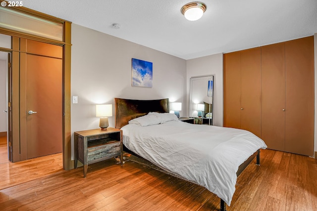 180 NW 107th Ave, Portland, OR 97229 - bedroom featuring light wood-type flooring and a closet