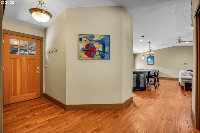 180 NW 107th Ave, Portland, OR 97229 - foyer entrance featuring light wood-style flooring, baseboards, lofted ceiling, and ceiling fan