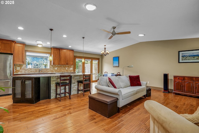 180 NW 107th Ave, Portland, OR 97229 - living room with ceiling fan, recessed lighting, light wood-style floors, lofted ceiling, and baseboards