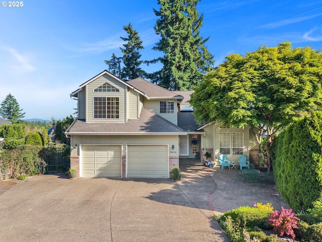 13910 SW Secretariet Ct, Beaverton, OR 97008 - traditional home with brick siding, concrete driveway, an attached garage, and a shingled roof