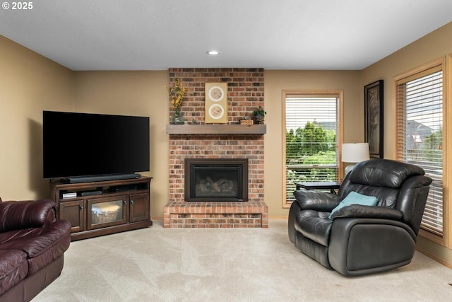13910 SW Secretariet Ct, Beaverton, OR 97008 - living room with carpet floors, a fireplace, and recessed lighting