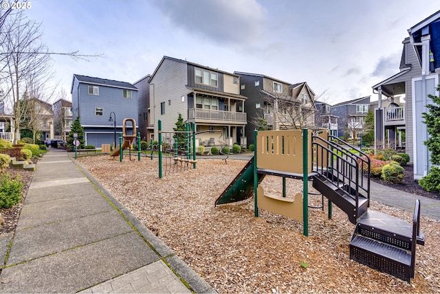 community jungle gym featuring a residential view