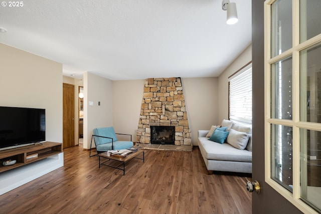 9115 NE Meadowbrook Cir, Vancouver, WA 98664 - living area featuring wood finished floors and a fireplace