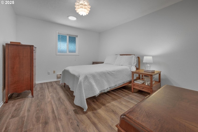 11144 NE Knott St, Portland, OR 97220 - bedroom with wood finished floors and baseboards