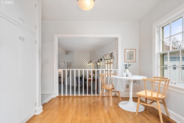 hall with hardwood / wood-style floors