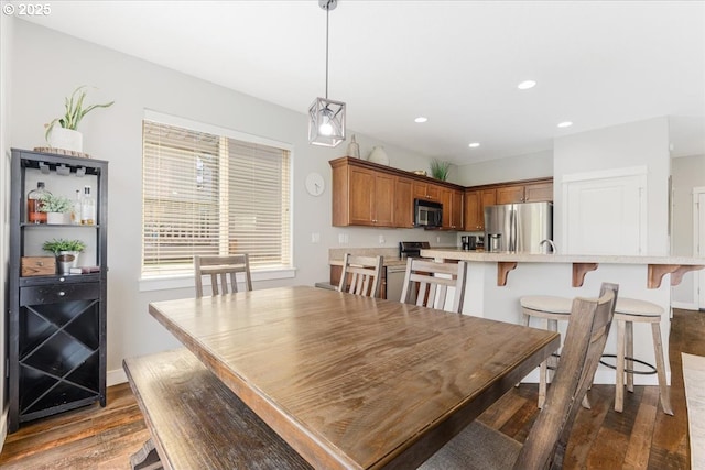 9050 SW 161st Ave, Beaverton, OR 97007 - dining room featuring dark wood-style flooring, recessed lighting, and baseboards