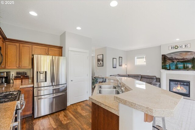 9050 SW 161st Ave, Beaverton, OR 97007 - dining space featuring wood finished floors and a glass covered fireplace