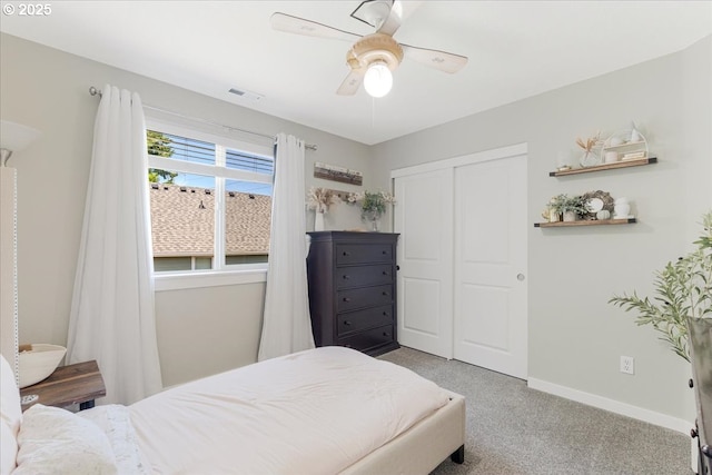 9050 SW 161st Ave, Beaverton, OR 97007 - bedroom featuring carpet, a closet, baseboards, and a ceiling fan
