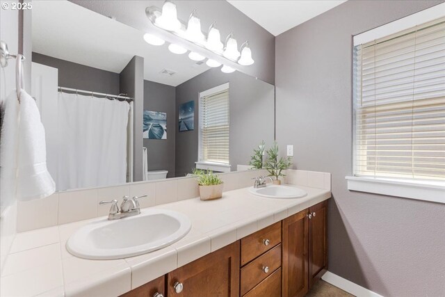9050 SW 161st Ave, Beaverton, OR 97007 - bedroom featuring light carpet and a ceiling fan