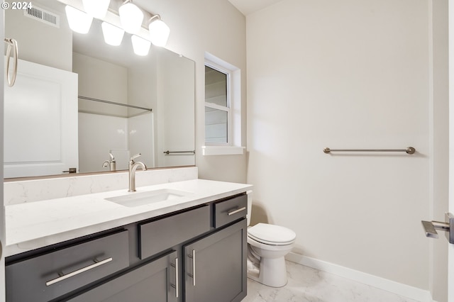 full bath featuring visible vents, baseboards, vanity, toilet, and marble finish floor