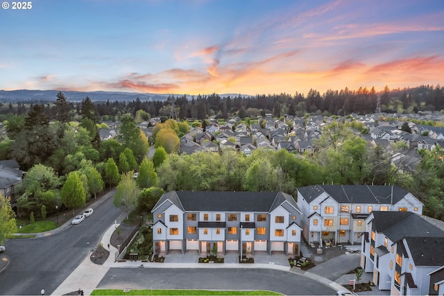 aerial view at dusk with a residential view