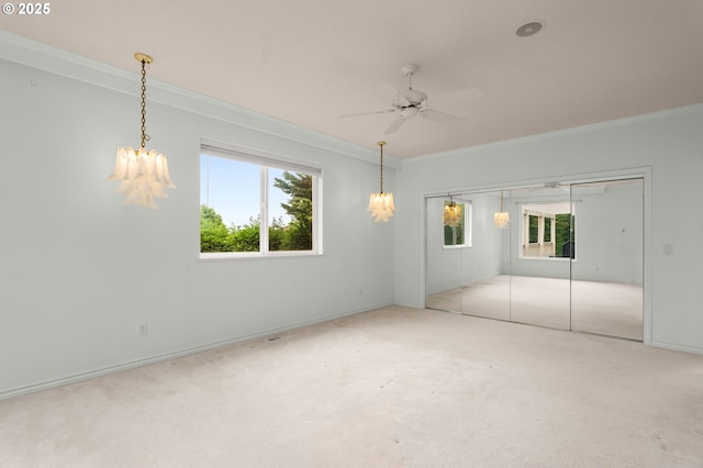23705 SW Everest Ct, Sherwood, OR 97140 - unfurnished bedroom with ornamental molding, multiple windows, carpet flooring, baseboards, and a chandelier