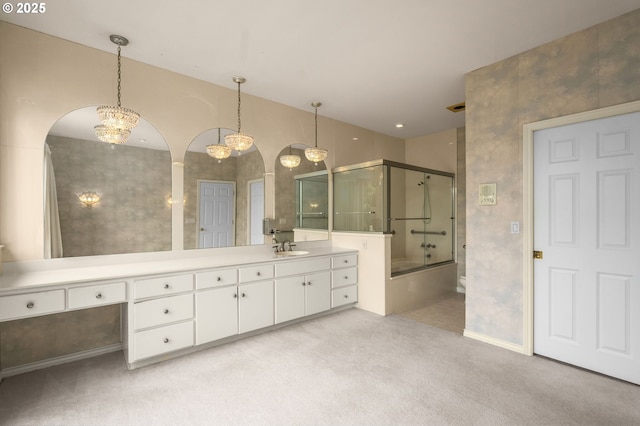 23705 SW Everest Ct, Sherwood, OR 97140 - full bathroom with vanity, bath / shower combo with glass door, baseboards, and a chandelier