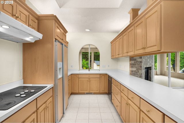23705 SW Everest Ct, Sherwood, OR 97140 - kitchen featuring black electric stovetop, under cabinet range hood, stainless steel dishwasher, a sink, and plenty of natural light