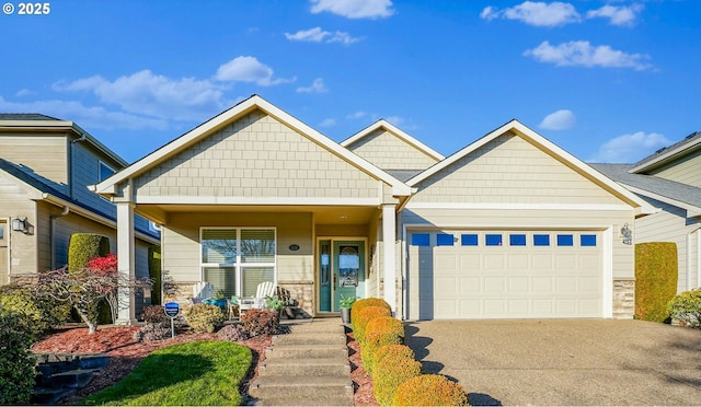 craftsman-style home featuring a garage and a porch