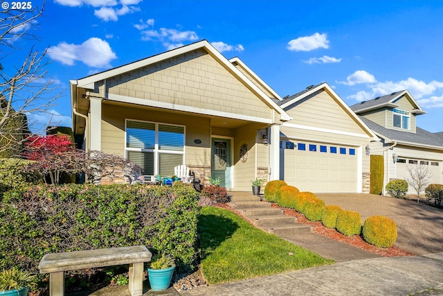 craftsman-style home featuring a garage and a porch