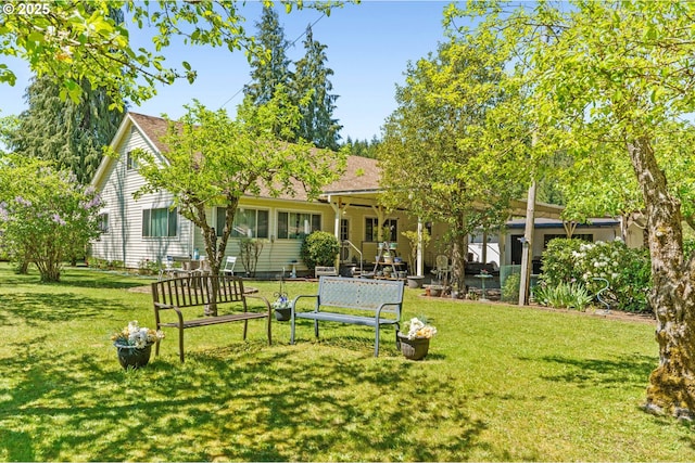 view of community with a yard